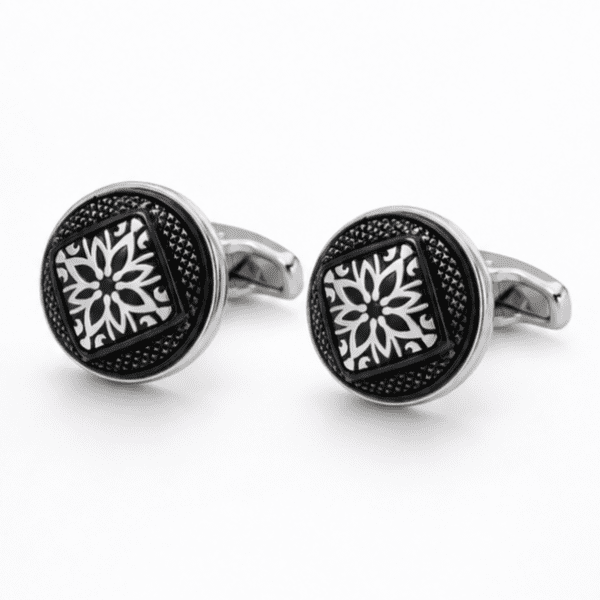 Pair of luxury black and silver floral pattern cufflinks for men's formal shirts.
