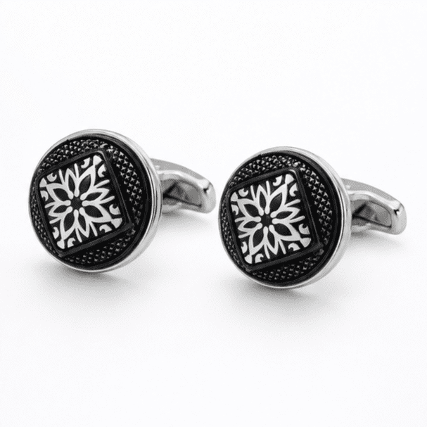 Pair of luxury black and silver floral pattern cufflinks for men's formal shirts.