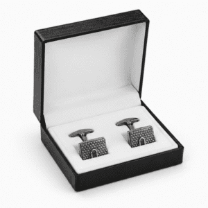 Luxury silver cufflinks displayed in premium gift box