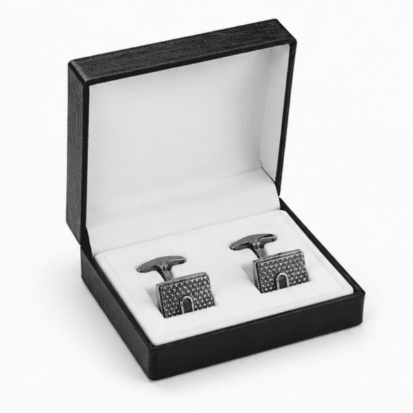 Luxury silver cufflinks displayed in premium gift box