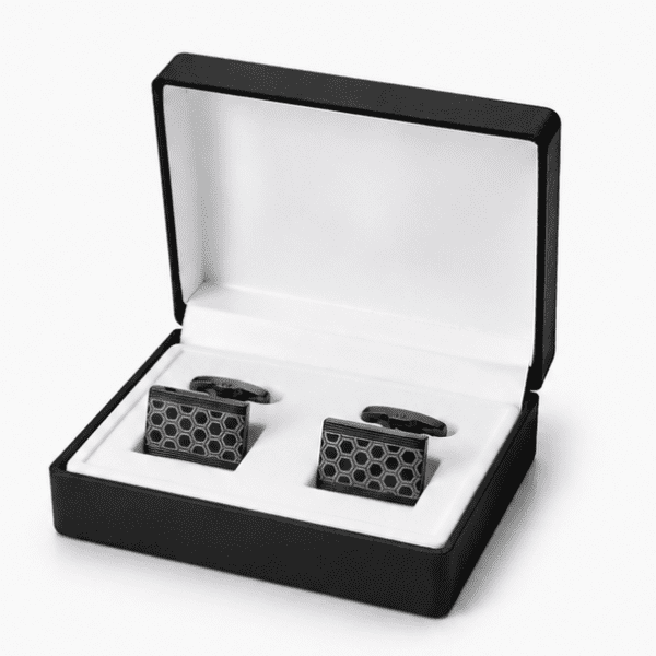 Black luxury cufflinks displayed in premium gift box