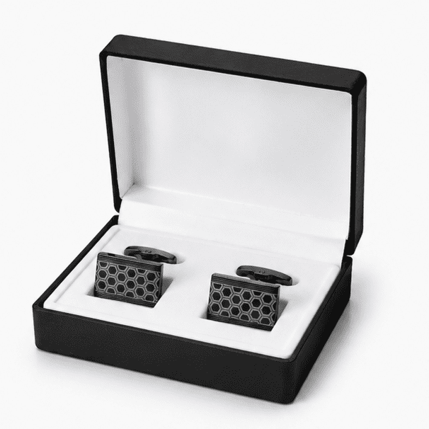Black luxury cufflinks displayed in premium gift box