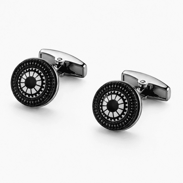 Pair of men's silver and black round gear wheel cufflinks displayed together on white background
