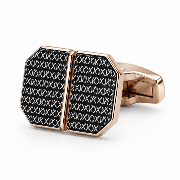 Close-up of rose gold octagonal cufflinks with black XO cross engraved pattern