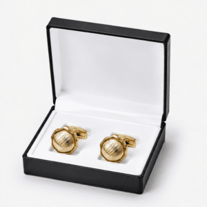 Luxury gold cufflinks displayed in premium gift box