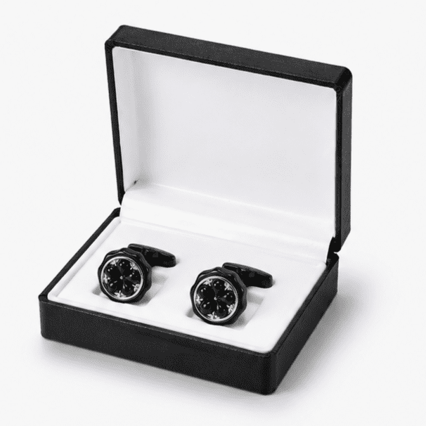 Luxury black round cufflinks displayed in premium gift box
