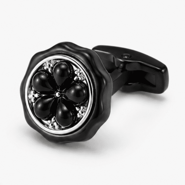 Close up view of black floral designer cufflinks for men