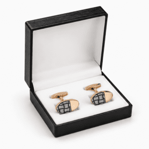 Luxury rose gold and black cufflinks presented in a premium gift box.