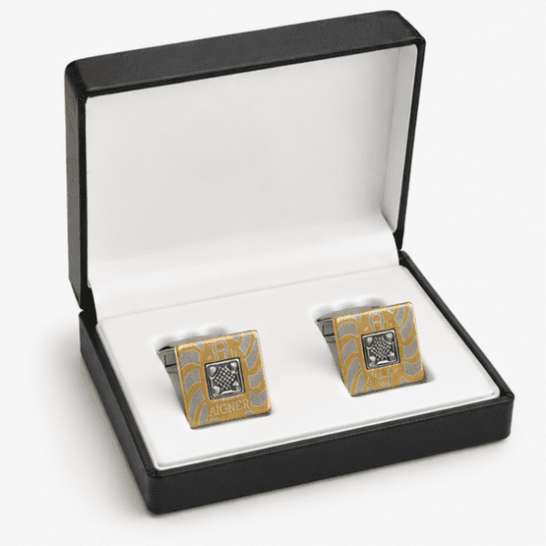 Luxury gold and silver cufflinks displayed in premium gift box for men