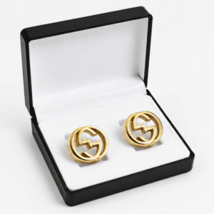 Gold interlocking round cufflinks for men displayed in premium box
