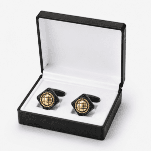 Luxury black gold cufflinks displayed in premium gift box