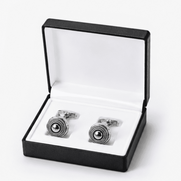 Luxury silver round cufflinks displayed in premium gift box