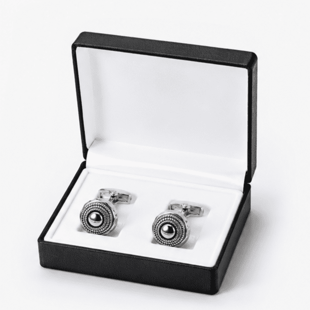 Luxury silver round cufflinks displayed in premium gift box