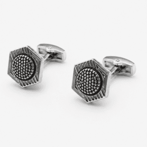 Close up view of geometric black silver designer cufflinks for men