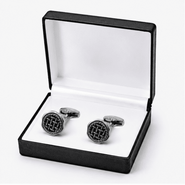 Luxury black silver cufflinks displayed in premium gift box