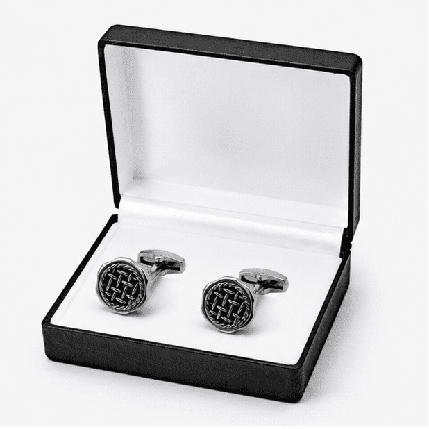 Luxury black silver cufflinks displayed in premium gift box